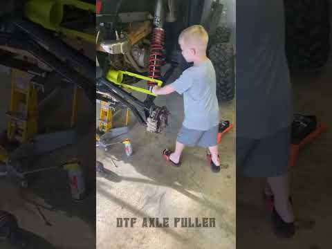 Kid pulls out stuck UTV axle using the DTF Axle Puller